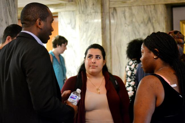 During our networking event, one of our alumni and a few of our current students take the time to learn more from each other and network with one another while receiving a free lunch.