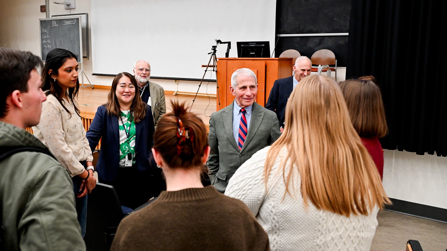 Anthony Fauci speaks with students after his lecture